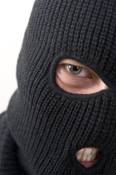 evil criminal wearing military mask