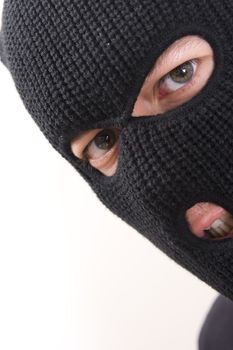 evil criminal wearing military mask