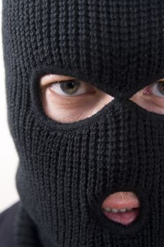 evil criminal wearing military mask