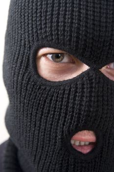 evil criminal wearing military mask