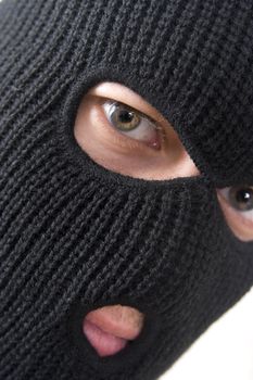 evil criminal wearing military mask