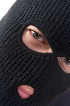 evil criminal wearing military mask
