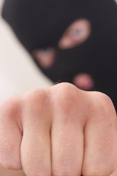evil criminal wearing military mask
