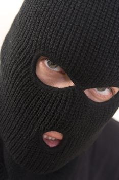 evil criminal wearing military mask