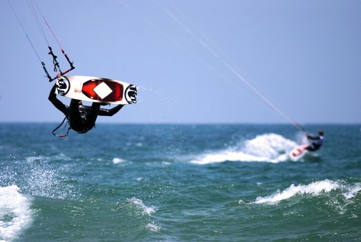 kite boarder / surfer flying through the air