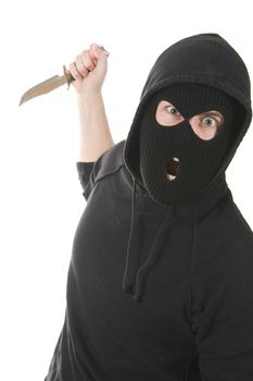 evil criminal wearing balaclava with a knife