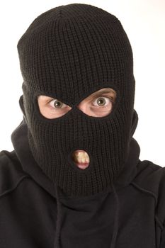 evil criminal wearing balaclava