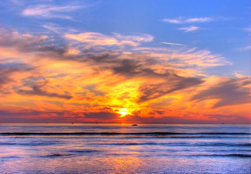 Sunset on the beach, orange blue red