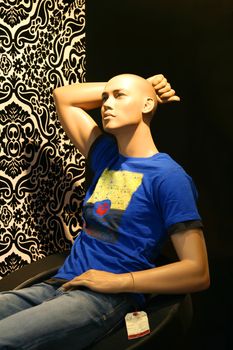 Dummy in a show-window of shop