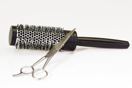Haircutting tools on bright background