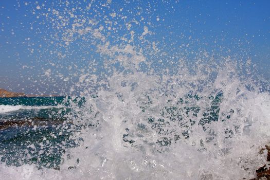 sea wave divided on the shore