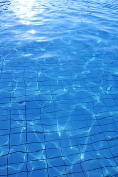 Blue clean water in the pool