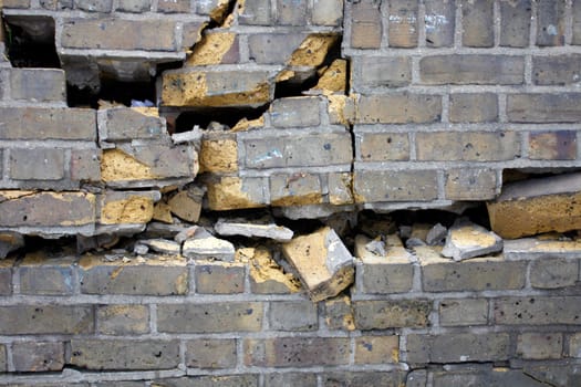 Destroyed brick wall