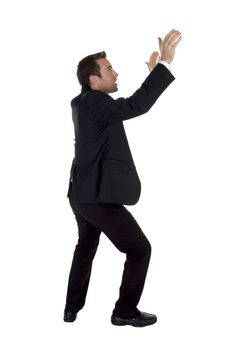 side view of success businessman with raised hands on white background