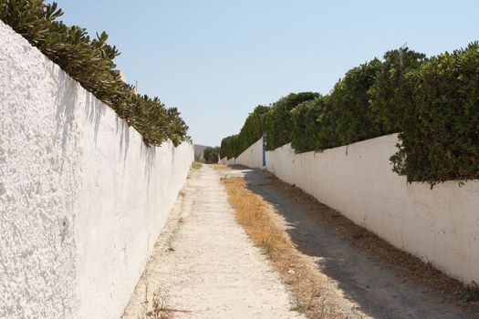 A narrow street on the island of Crete in Greece