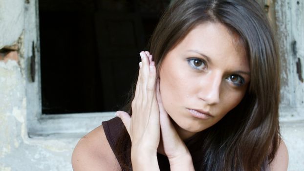 Young girl from Poland in old, cut manor house