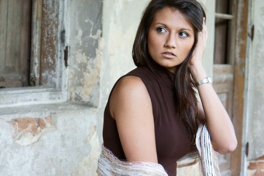 Young girl from Poland in old, cut manor house