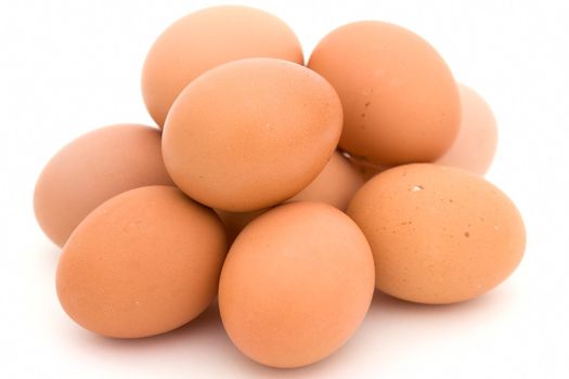 Heap of eggs on a white background