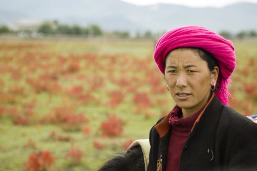 China, Yunnan province, Shangrila city. Nomad woman portrait.