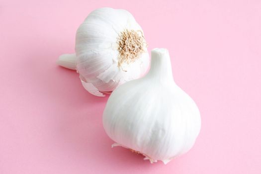 Fresh garlic on a wooden background