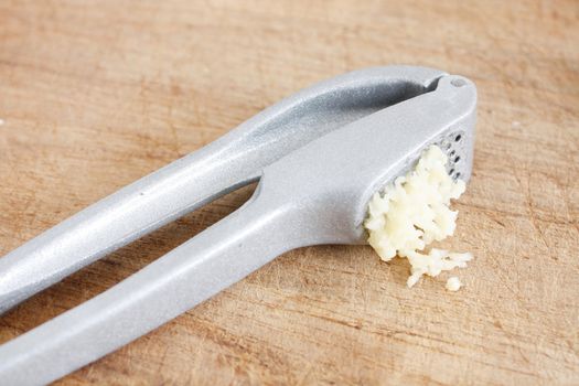 Fresh garlic on a wooden background