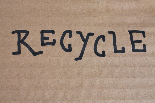 A drawing of a recycle logo