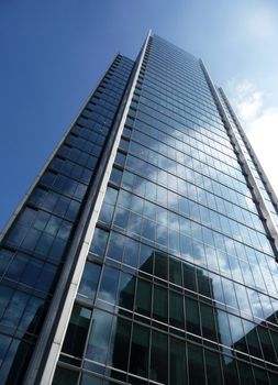 A shiny glass building in Londons Docklands.
