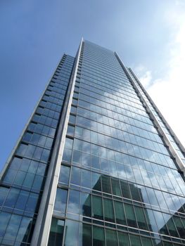 A shiny glass building in Londons Docklands.