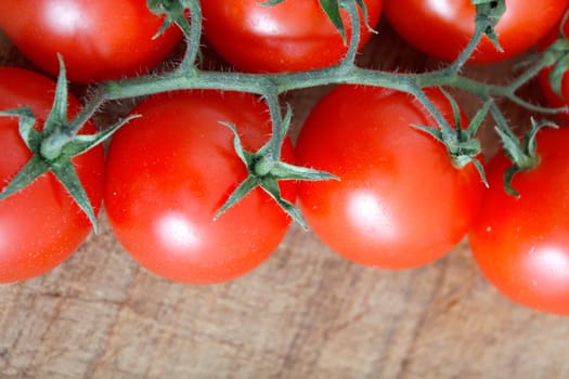 Delicious tomatoes on a chopping board