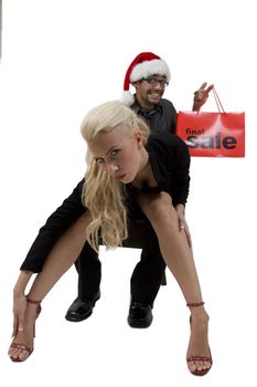 full body pose of handsome guy and pretty lady with shopping bag on isolated background