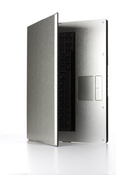 aluminium notebook computer on white background