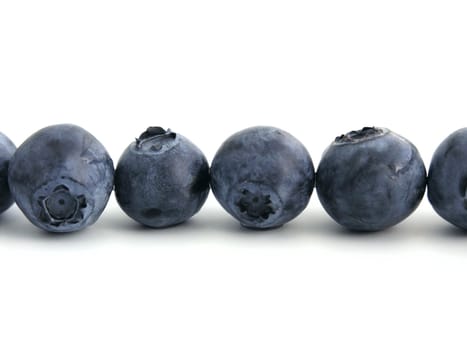 sweet bilberries on white background