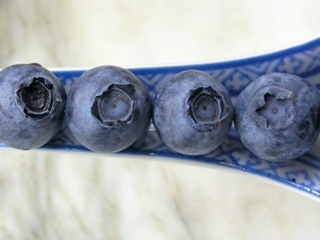 sweet bilberries on white background