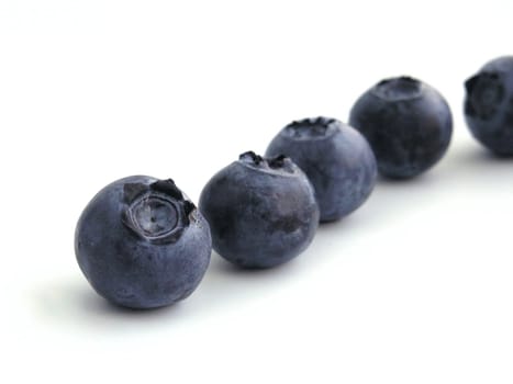 sweet bilberries on white background