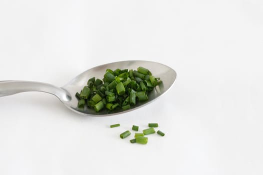 Freshly chopped fragrant chives in a horizontal composition