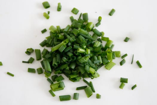 Freshly chopped fragrant chives in a horizontal composition