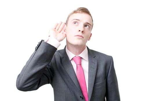 A business man listening isolated on white