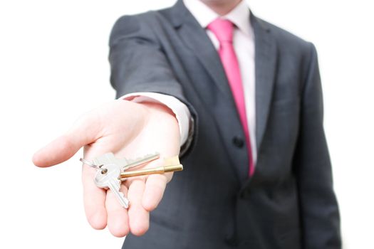 A business man giving you the keys to a home