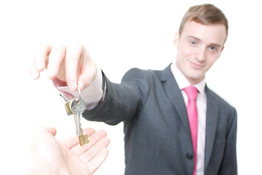 A business man giving you the keys to a home
