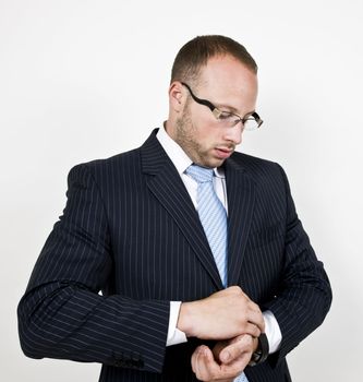 businessman wearing the watch on isolated background

