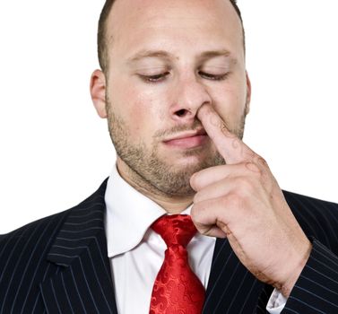 man digging his nose on isolated background
