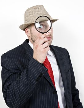man with magnifying glass on isolated background
