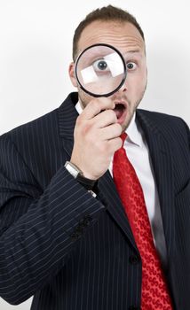 man with magnified eyes on isolated background
