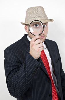 detective with magnifying glass on isolated background
