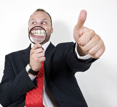 man giving approval with magnified teeth
