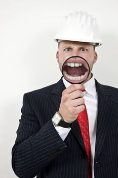 architect with magnified teeth on isolated background
