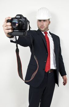 engineer with camera on isolated background
