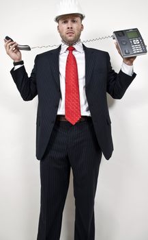 male with wired phone on isolated background
