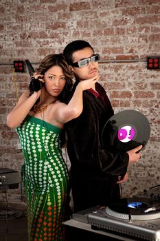 Cool Asian Couple at a 1970s Disco Music Party