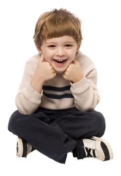 Child having a good time posing on a white background